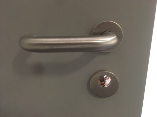 Poignée de porte Glutz ronde serrure ronde