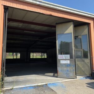 Porte de hangar à accordéons métallique