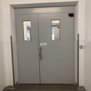 Porte double métallique assymétrique automatique